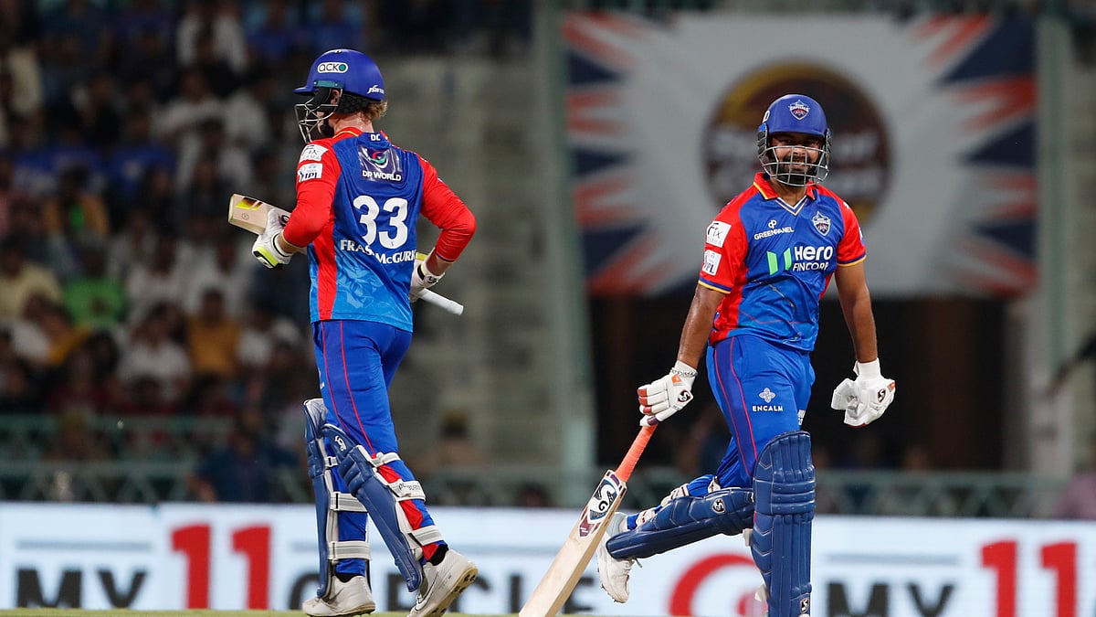 AP Photo/Surjeet Yadav : Delhi Capitals' captain Rishabh Pant, right, and Jake Fraser-McGurk run between the wickets to score during the Indian Premier League cricket match between Lucknow Super Giants and Delhi Capitals in Lucknow.