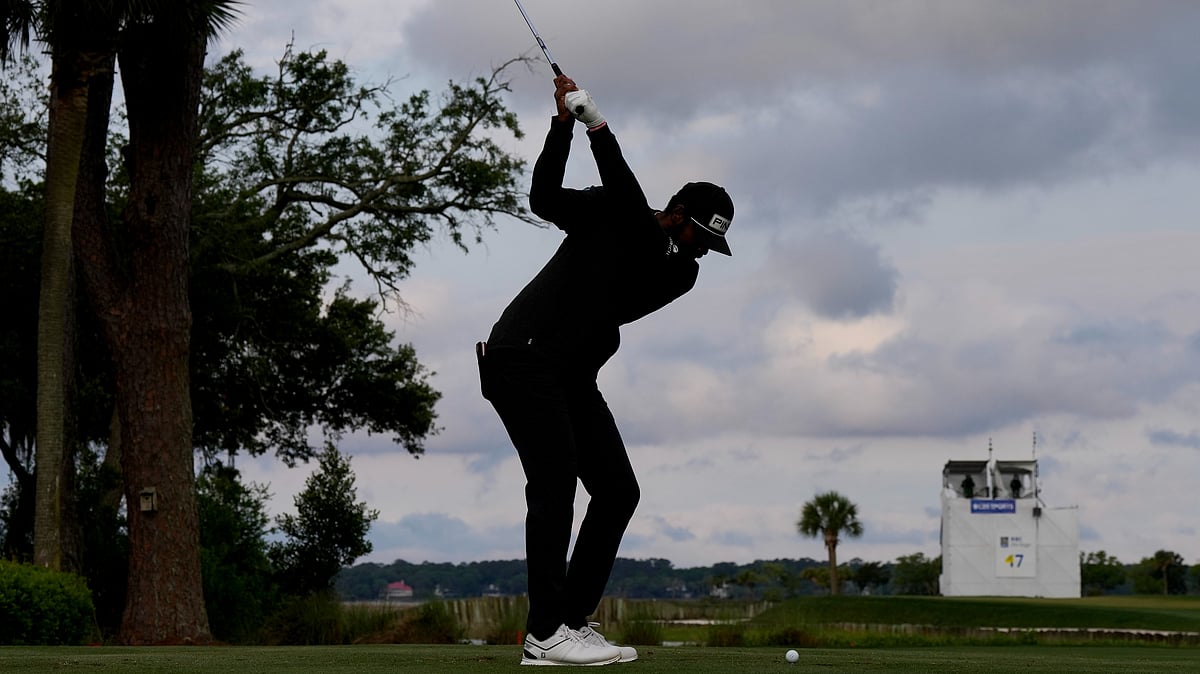 Chris Carlson/AP : (Representative Photo) Sahith Theegala hits his tee shot on the 17th hole during the completion of the weather-delayed final round at the RBC Heritage golf tournament, Monday, April 22, 2024, in Hilton Head Island, S.C.