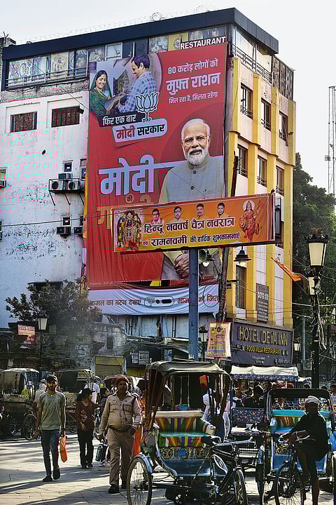 A hoarding of PM Narendra Modi at Godowlia Chowk