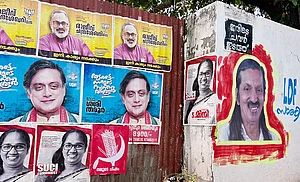 NurPhoto via Getty Images : Political posters are being displayed for the upcoming Lok Sabha 2024 election in Thiruvananthapuram, Kerala