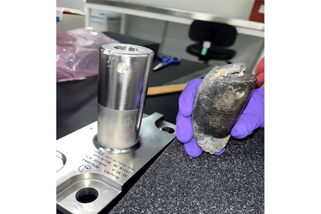 This undated photo provided by NASA shows a recovered chunk of space junk from equipment discarded at the International Space Station. The cylindrical object that tore through a home in Naples, Fla., March 8, 2024, was subsequently taken to the Kennedy Space Center in Cape Canaveral, Fla., for analysis. - AP