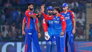 AP Photo/Pankaj Nangia : Delhi Capitals' Kuldeep Yadav, second right, celebrates the wicket of Gujarat Titans' Rahul Tewatia during the Indian Premier League cricket match between Delhi Capitals and Gujarat Titans in New Delhi.