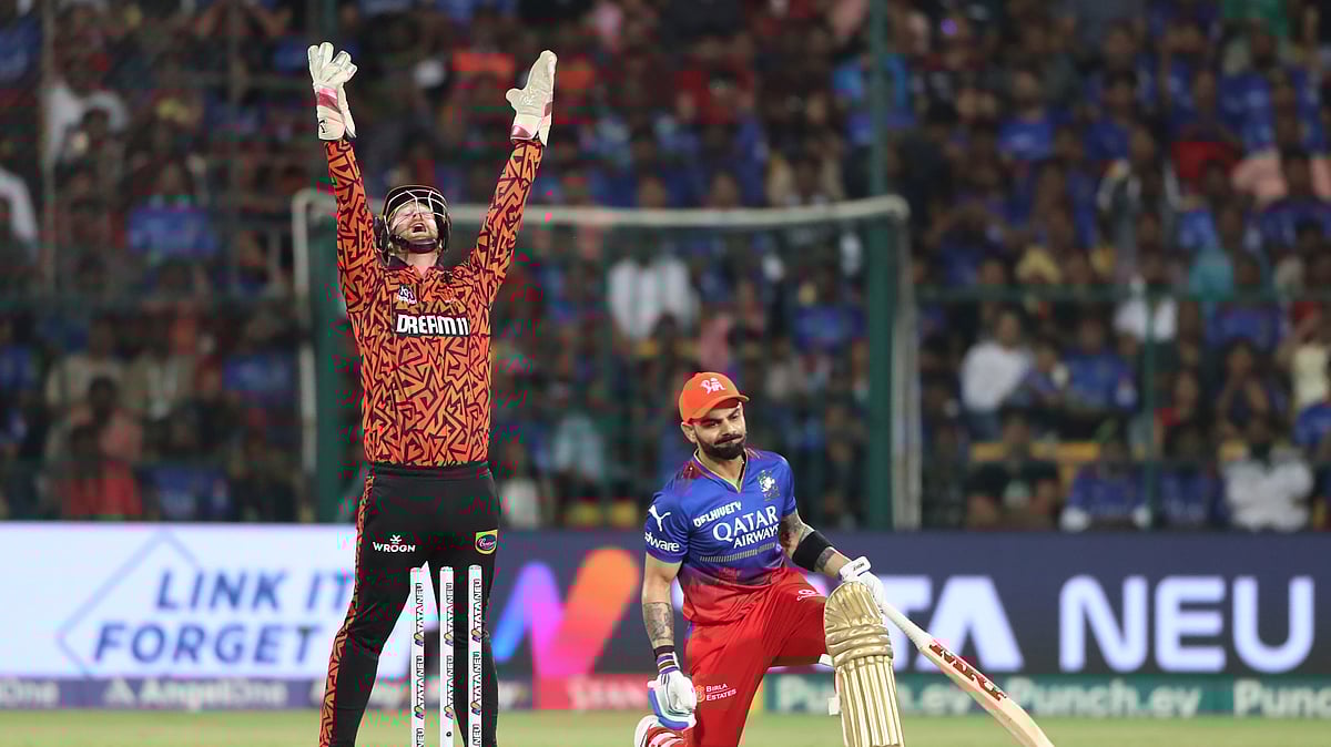 Royal Challengers Bengaluru's Virat Kohli reacts after being bowled out during the Indian Premier League cricket match between Royal Challengers Bengaluru and Sunrisers Hyderabad in Bengaluru. - AP Photo/Kashif Masood