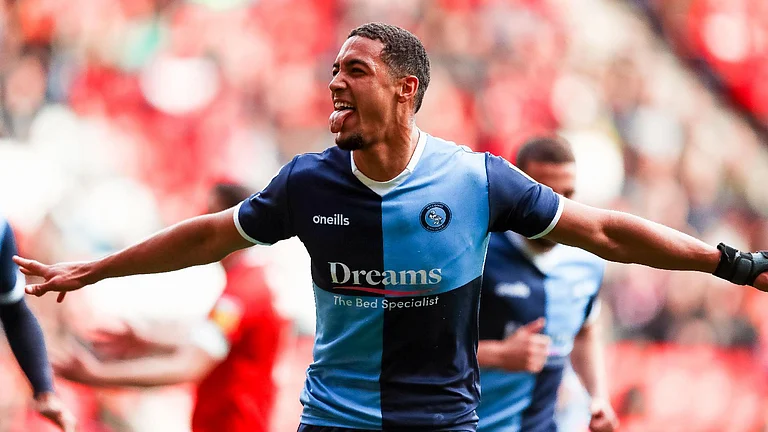 Wycombe Wanderers’ Chris Forino Joseph celebrates scoring their side’s first goal of the game during the Sky Bet League One match at The Valley, London - File