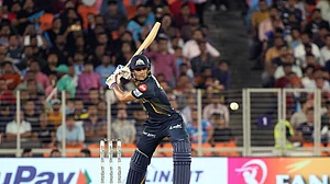 AP Photo/STR : Gujarat Titans' captain Shubman Gill plays a shot during the Indian Premier League cricket match between Gujarat Titans and Punjab Kings in Ahmedabad.