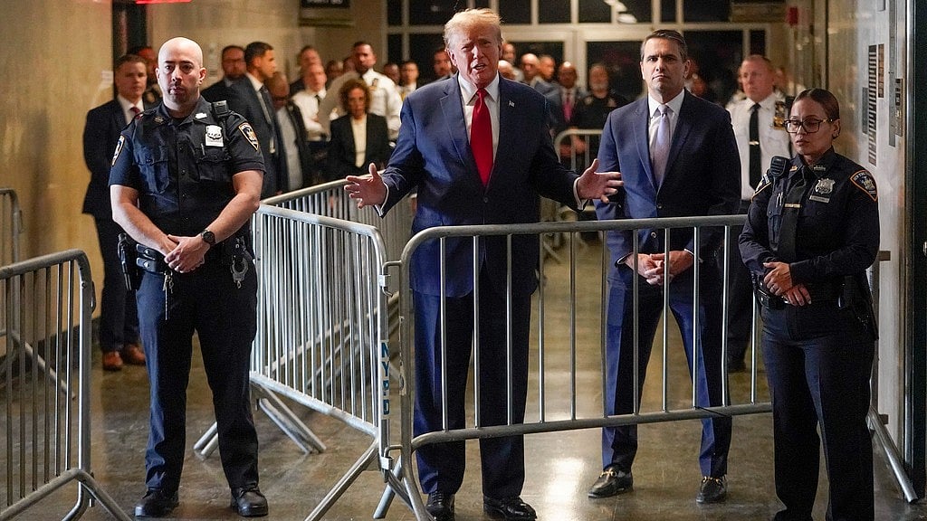 Former President Donald Trump speaks before entering the courtroom at Manhattan criminal court, Thursday, Feb. 15, 2024, in New York.  - AP