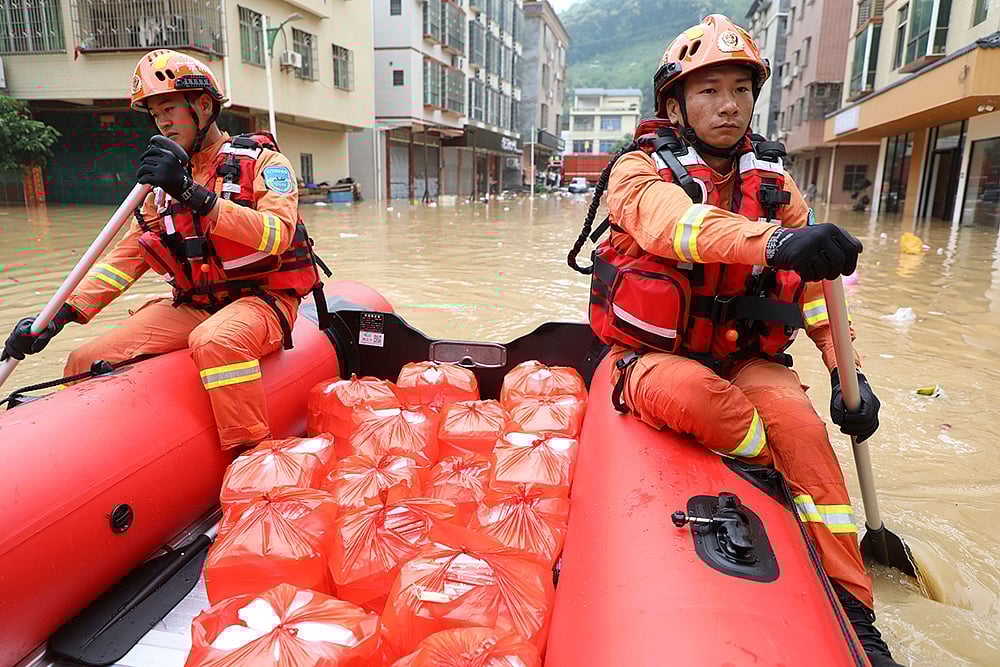 | Photo: Huang Guobao/Xinhua via AP : China Floods
