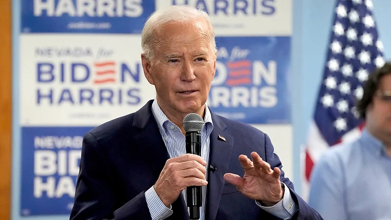 President Joe Biden speaks at the Washoe Democratic Party Office in Reno, Nev., March 19, 2024. - AP