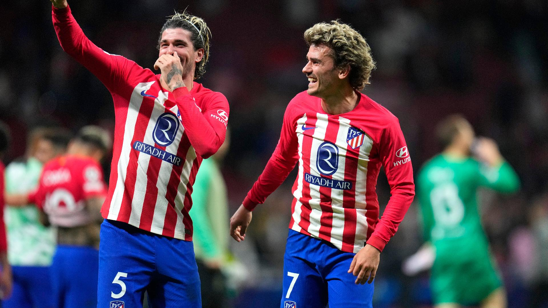 Manu Fernandez/AP : Antoine Griezmann, right, helped Atletico Madrid to victory.