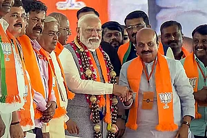 | Photo: PTI : PM Modi in Karnataka