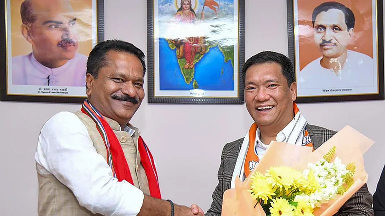 Arunachal BJP leader Ashok Singhal with CM Pema Khandu | - PTI