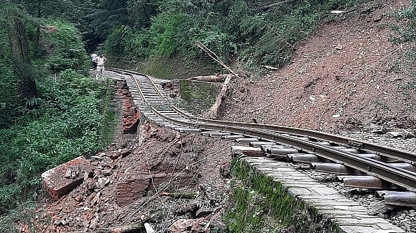 A view of damaged Shimla-Kalka railway track, an UNESCO world heritage, after 50 meters of a bridge was swept away due to landslides caused by incessant rains | - AFP via Getty Images