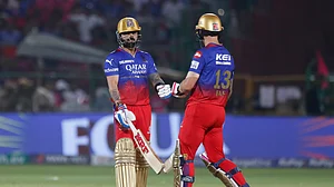 AP Photo/Pankaj Nangia : Royal Challengers Bengaluru's captain Faf du Plessis and Virat Kohli bump fists during the Indian Premier League cricket match between Rajasthan Royals and Royal Challengers Bengaluru in Jaipur.