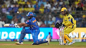 AP Photo/Rafiq Maqbool : Mumbai Indians' Rohit Sharma celebrates his fifty runs during the Indian Premier League cricket match between Mumbai Indians and Chennai Super Kings in Mumbai.