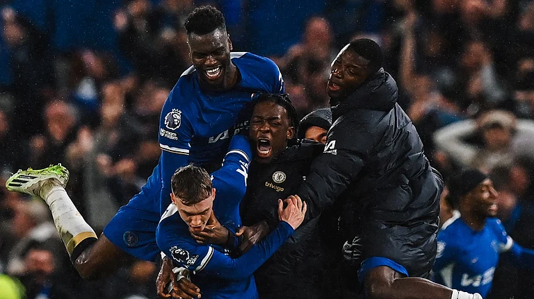 Chelsea players celebrate after winning match against Manchester United on Thursday - X/@ManUtd