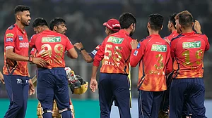 AP Photo/Bikas Das : Punjab Kings players celebrate after winning the Indian Premier League cricket match against Kolkata Knight Riders in Kolkata.