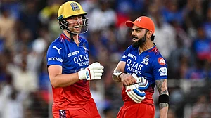 Will Jacks (L) and Virat Kohli (R) combined to lead the Royal Challengers Bangalore to a much-needed win