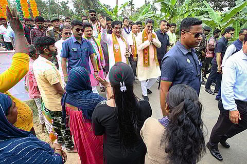 Manik Saha with BJP candidate Dipak Majumdar