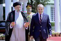 AP  : Iran President Arrives In Pakistan, Meets PM Shehbaz Sharif 