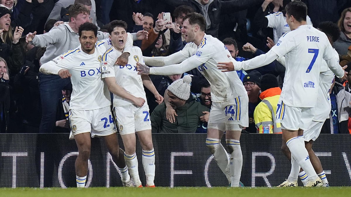 Danny Lawson/PA : Leeds players celebrate as Daniel James, second left, scores his side’s third goal.