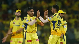 AP Photo/R.Parthiban : Chennai Super Kings' Tushar Deshpande, centre, celebrates the dismissal of Sunrisers Hyderabad's Travis Head during the Indian Premier League cricket match between Chennai Super Kings and Sunrisers Hyderabad in Chennai.