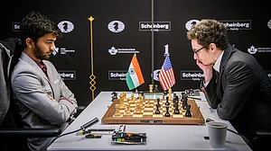 X/International Chess Federation : Despite Gukesh's dwindling time, he secured a draw by navigating into a queen endgame against top seed Fabiano Caruana at the FIDE Candidates chess tournament in Toronto.