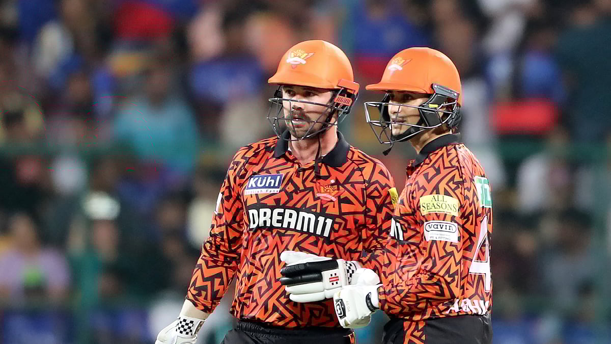 Sunrisers Hyderabad's Travis Head, left, and Abhishek Sharma chat during the Indian Premier League cricket match between Royal Challengers Bengaluru and Sunrisers Hyderabad in Bengaluru. - AP Photo/Kashif Masood