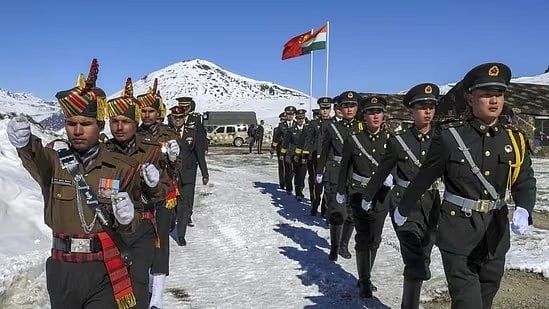 Indian and Chinese soldiers marching at the border | - PTI
