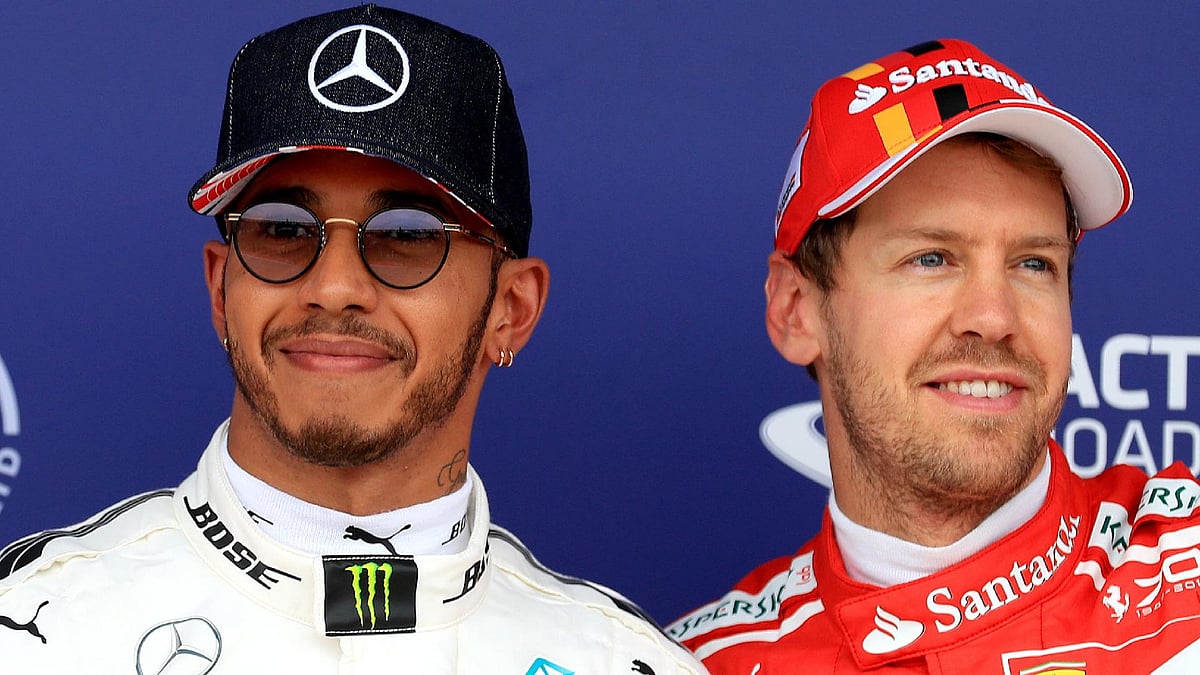 Photo: Tim Goode/PA : Mercedes’ Lewis Hamilton (left) has tipped Sebastian Vettel as his potential replacement.