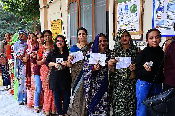 Getty Images : Women are standing in line to cast their votes for the Rajasthan Assembly elections in Jaipur, Rajasthan, India, on November 25, 2023. 