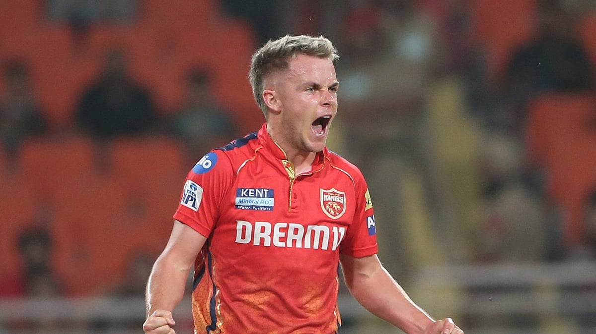 AP Photo/Surjeet Yadav : Punjab Kings' Sam Curran celebrates the dismissal of Sunrisers Hyderabad's Abhishek Sharma during the Indian Premier League cricket match between Sunrisers Hyderabad and Punjab Kings in Mohali.