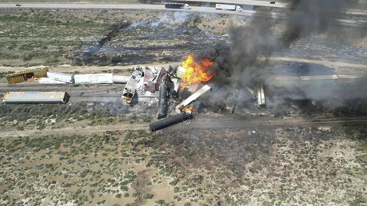 Freight Train carrying gasoline and propane derailed igniting fire. - X