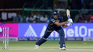 AP Photo/Surjeet Yadav : Gujarat Titans' captain Shubman Gill plays a shot during the Indian Premier League cricket match between Gujarat Titans and Rajasthan Royals in Jaipur.