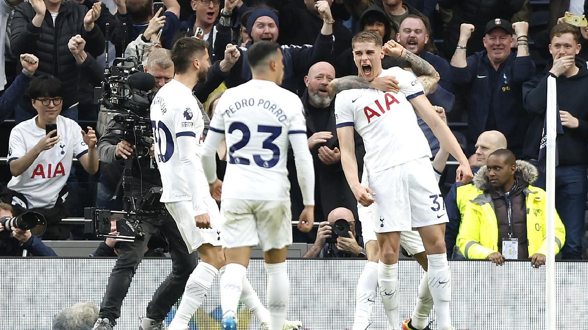 Micky van de Ven (right) celebrates scoring in Tottenham’s 3-1 win over Nottingham Forest. - (Nigel French/PA)
