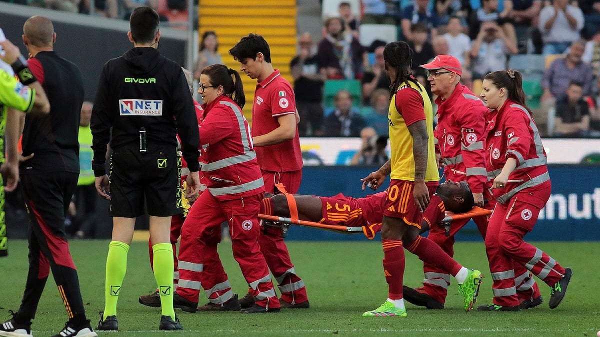  Andrea Bressanutti/AP/PA : Roma’s Evan Ndicka is carried from the pitch on a stretcher.