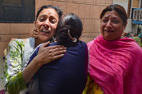 Madanpuri wall collapse victims' relatives