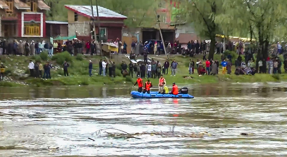 PTI : Rescue operation underway after a boat capsized in the Jhelum river, on the outskirts of Srinagar, Tuesday, April 16, 2024. 