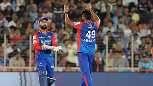 AP Photo/Pravin Indrekar : Delhi Capitals' Mukesh Kumar, right, celebrates with captain Rishabh Pant the wicket of Gujarat Titans' Wriddhiman Saha during the Indian Premier League cricket match between Delhi Capitals and Gujarat Titans in Ahmedabad.