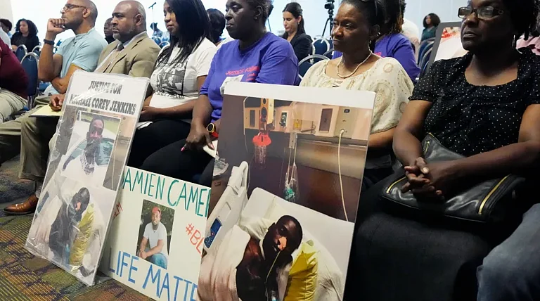Families of victims- Michael Corey Jenkins and Eddie Terrell Parker - AP