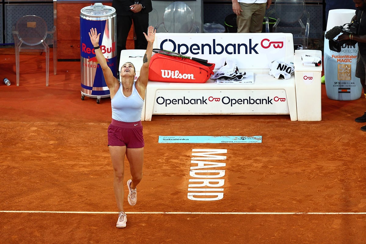 X | MMOPEN : Aryna Sabalenka at the Madrid Open tennis court. 