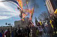 Getty Images : Members of the Islamic Revolutionary Guard Corps (IRGC) are burning flags of Israel and the U.S. during a funeral for members of the IRGC Quds Force who were killed in an Israeli air strike in Syria, in Tehran, Iran, on April, 2024. 