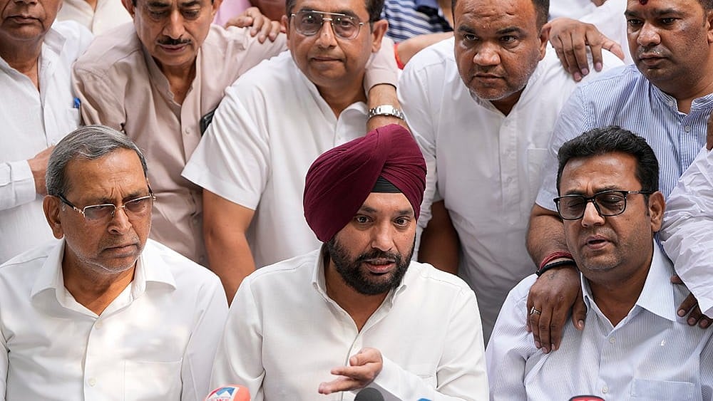 | Photo: PTI/Ravi Choudhary : Arvinder Singh Lovely addressing media