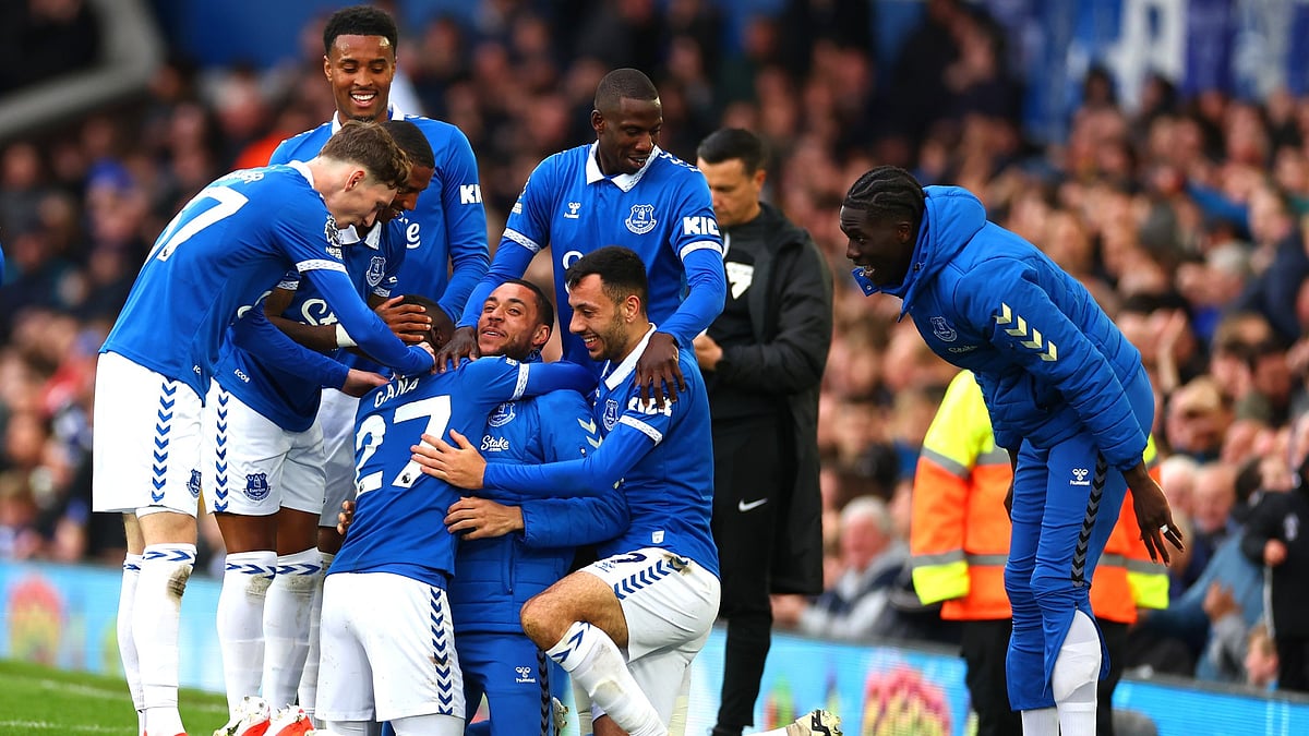 Idrissa Gueye is mobbed by his Everton team-mates after scoring against Brentford. - null