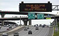 AP : Motorists travelling are reminded of possible traffic delays due to solar eclipse. 