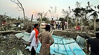 PTI Photo : Houses are damaged and electric poles fell after a heavy storm that left at least five people dead, in Jalpaiguri, West Bengal, March 31, 2024.