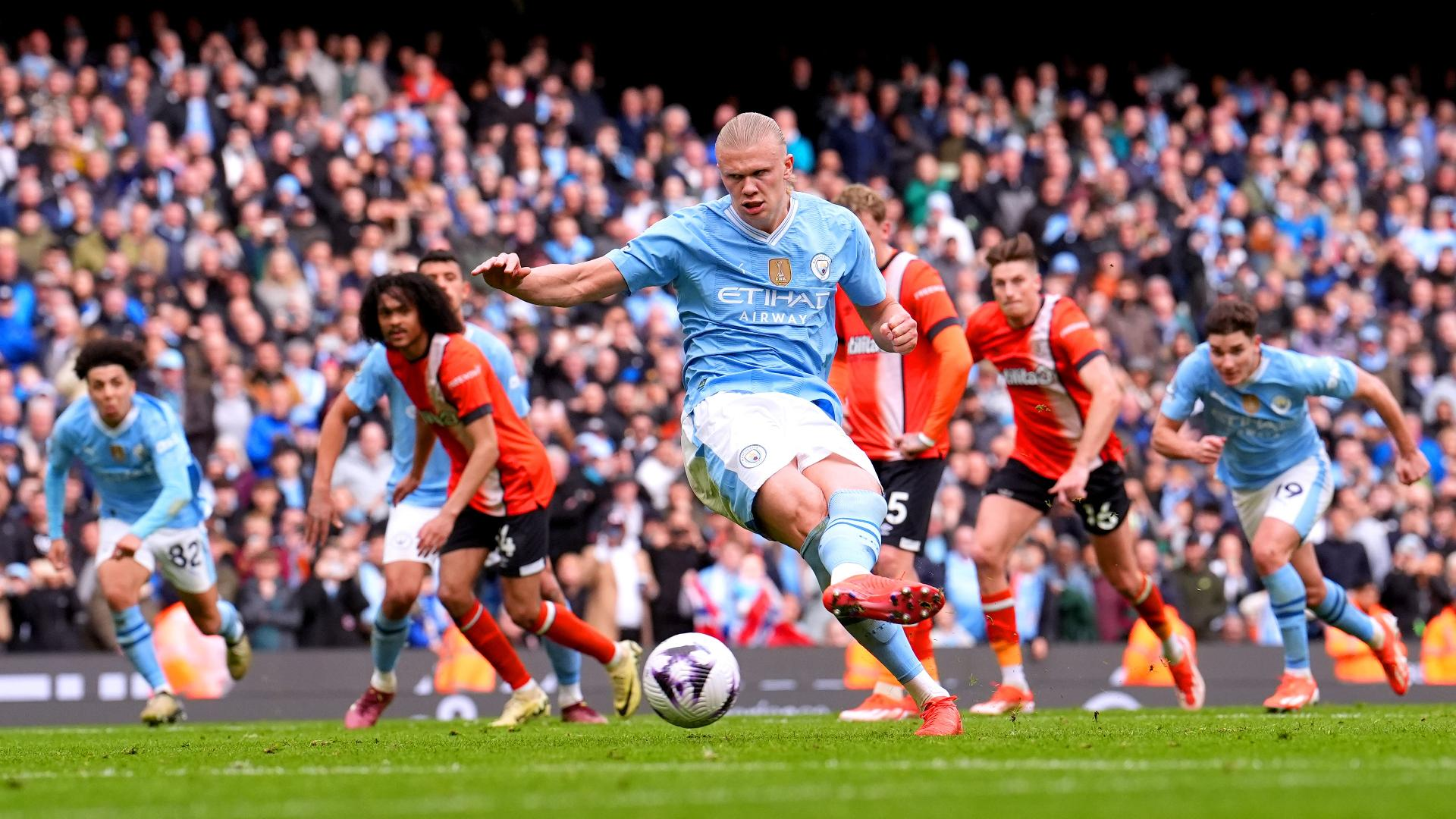 Martin Rickett/PA : Manchester City’s Erling Haaland scores against Luton