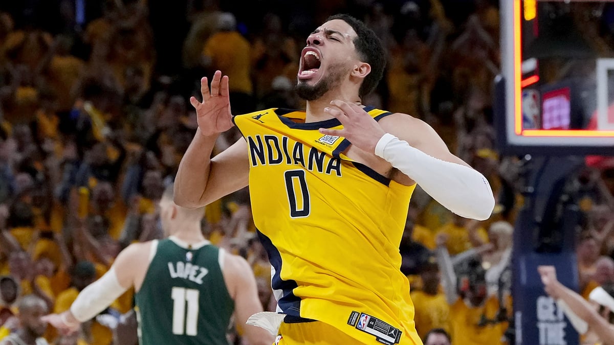 Tyrese Haliburton #0 of the Indiana Pacers celebrates after beating the Milwaukee Bucks 121-119 in overtime during game three of the Eastern Conference First Round Playoffs at Gainbridge Fieldhouse on April 26, 2024.