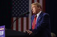 Getty Images : In a post on his social media site, Trump described the ad as “FAKE” and claimed it featured former President Ronald Reagan speaking negatively about tariffs. 