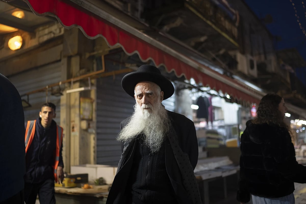 An elderly Orthodox Jewish man walks in Jerusalem after Iran's attack |
 - AP