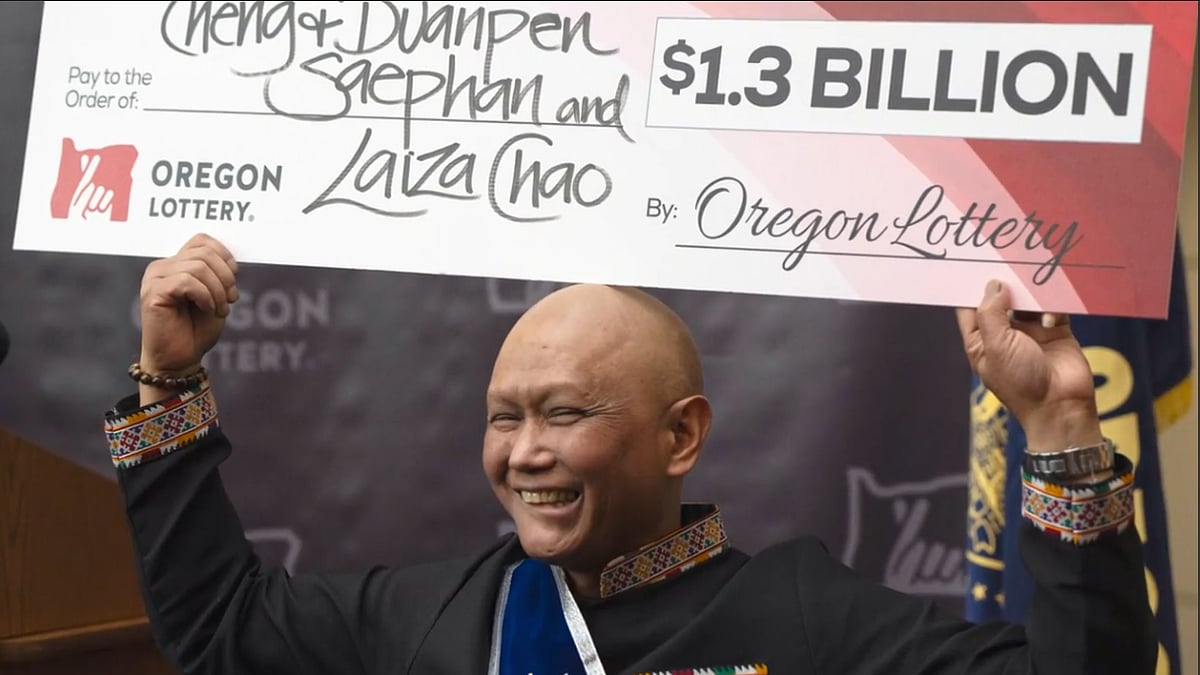 AP : An immigrant from Laos, battling cancer, won a $1.3 billion Powerball jackpot